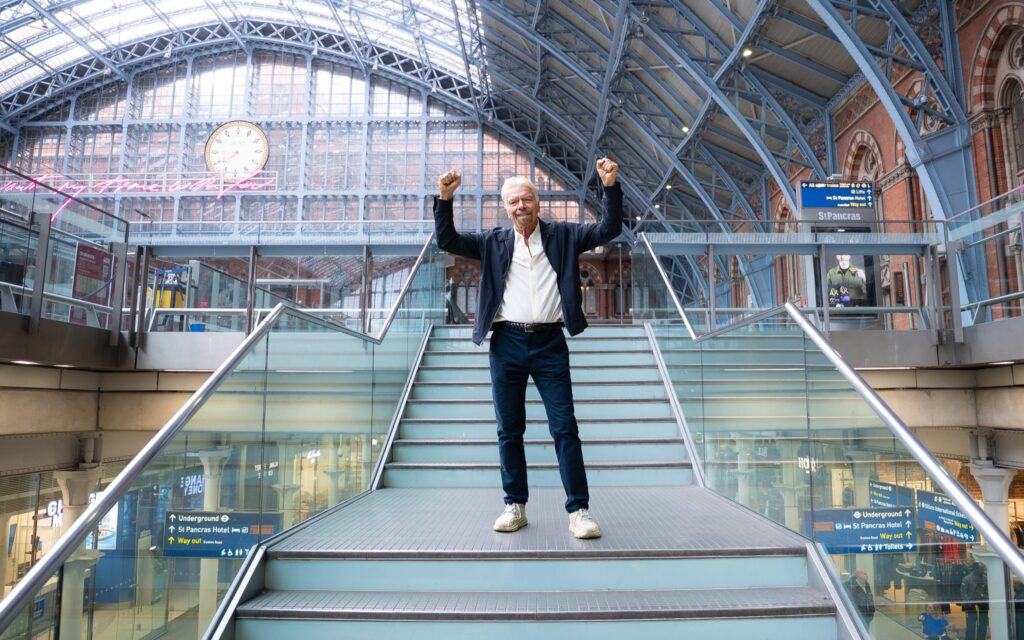 Richard Branson celebrating Virgin Trains Channel Tunnel Crossing Operations