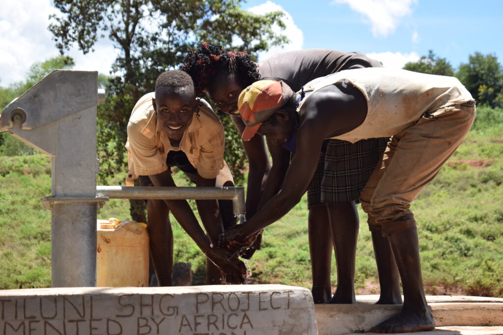 Just a Drop, Community With A Water Pump
