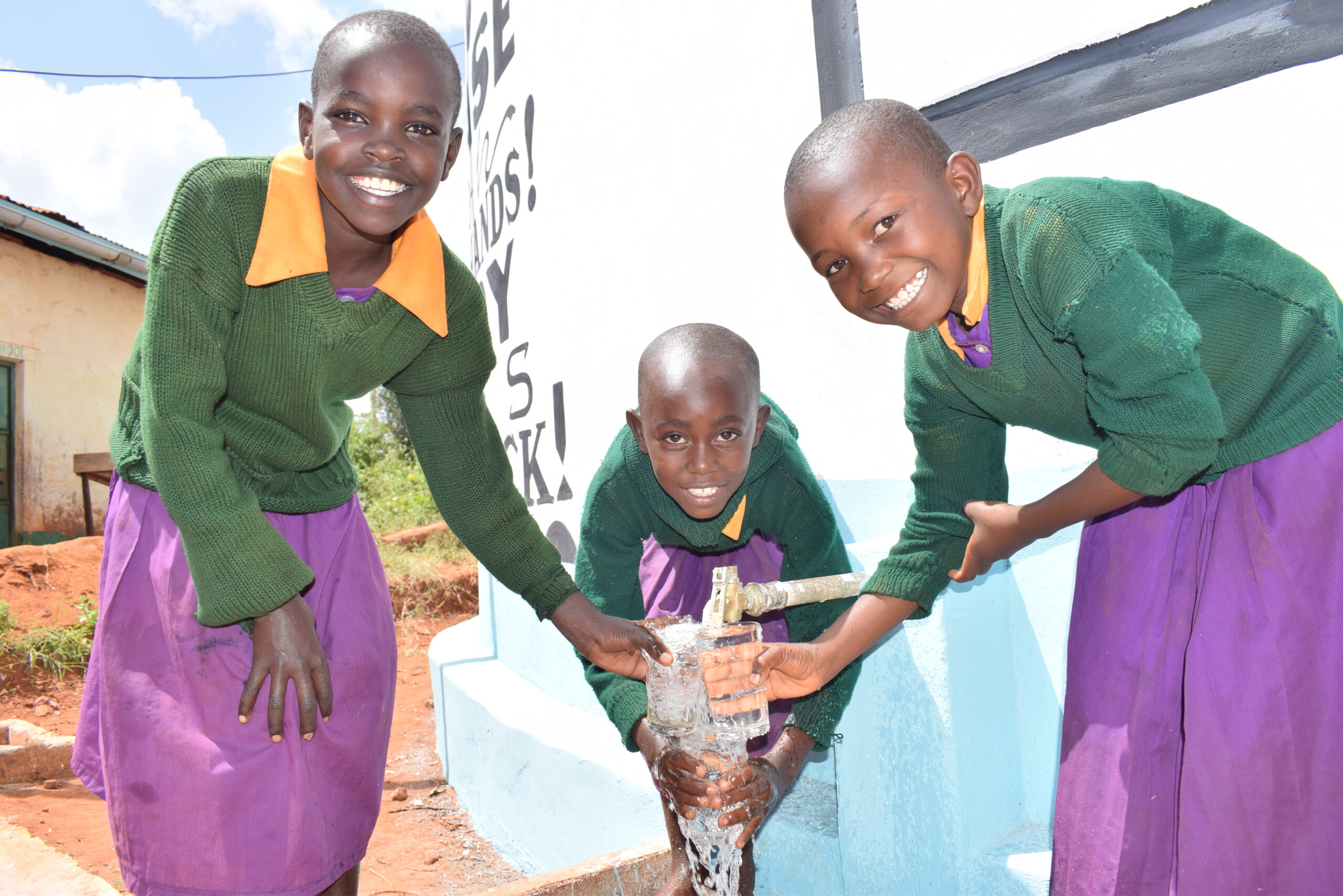 Just a Drop, Kenya, Kyeni Primary pupils with clean and safe water